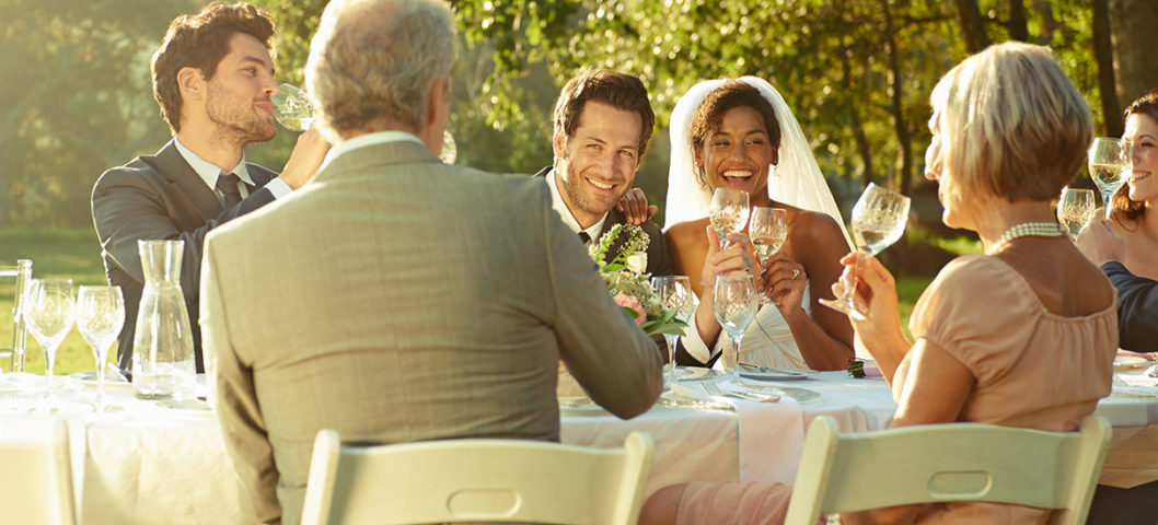 Couple making a speech on their wedding day with wedding quotes